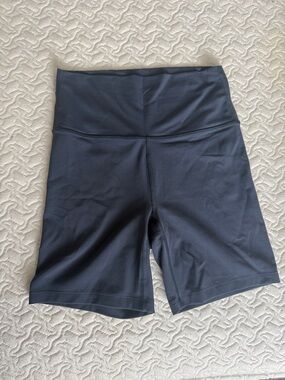 Target women’s everyday soft ultra high-rise 6 inch inseam navy bike shorts